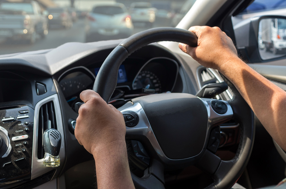 Man Driving A Vehicle